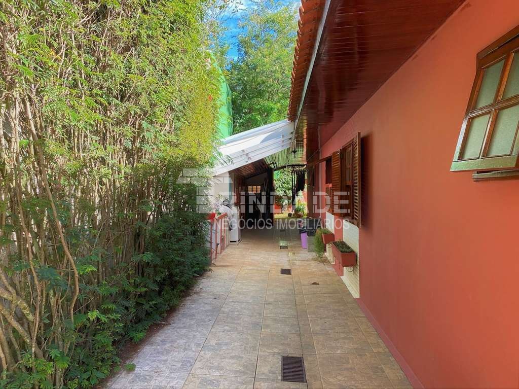 Casa Térrea com 3 suítes, lote plano, piscina e Gourmet, foto 29 de 34